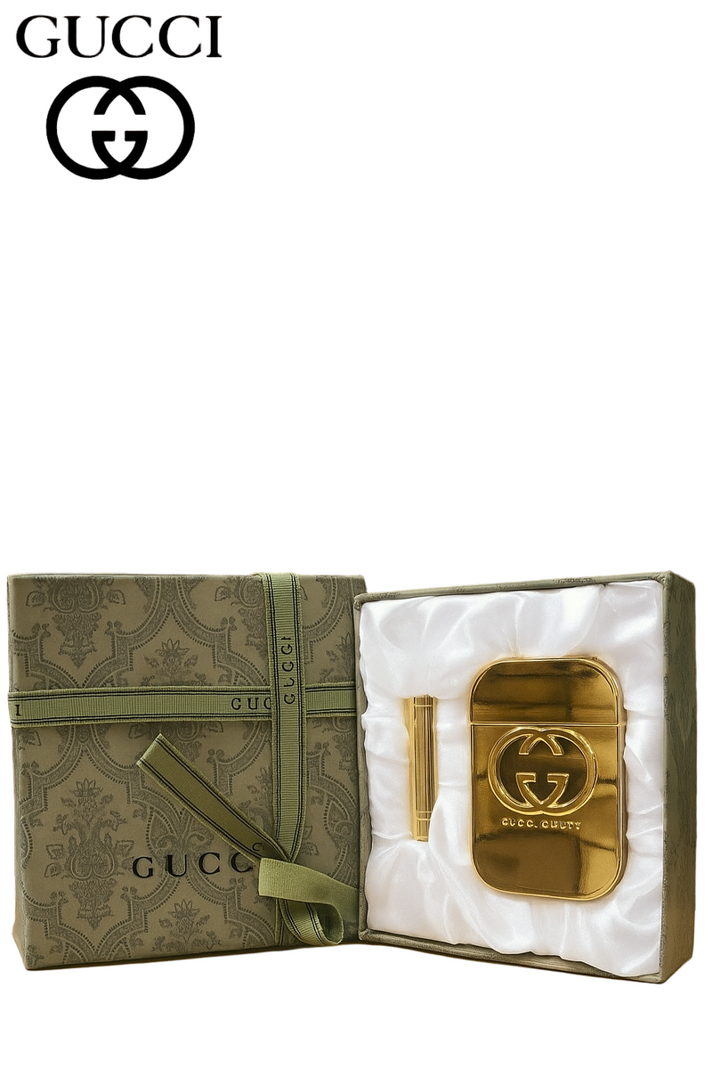 Gold Gucci accessory in a decorative box with Gucci logo on a brown background