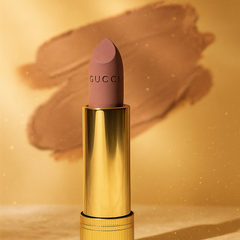 Gucci lipstick with gold casing 