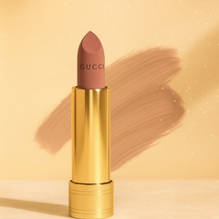 Gucci lipstick with gold casing 