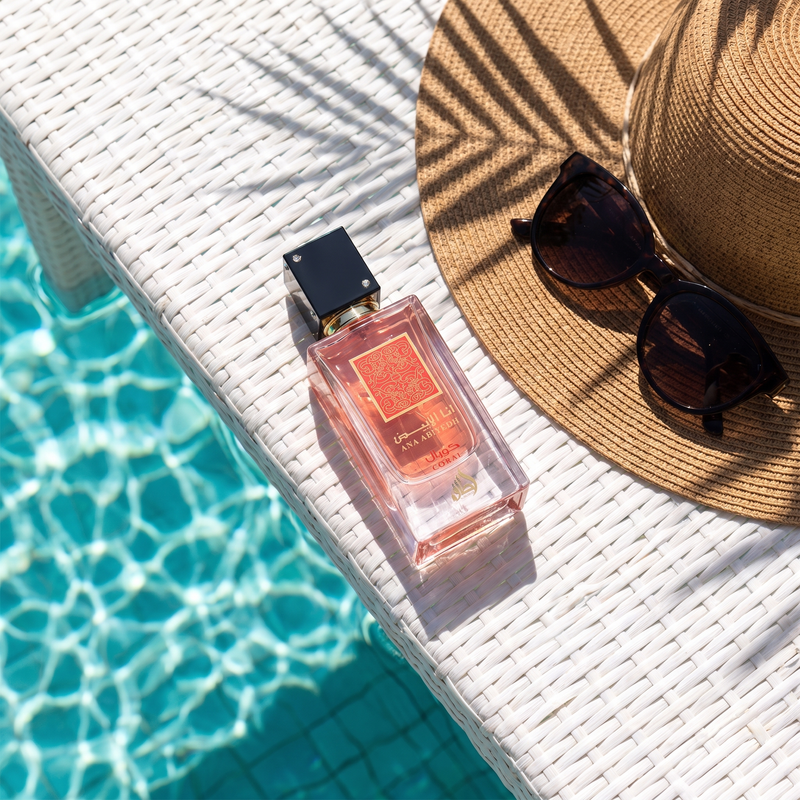 Lattafa Ana Abiyedh Coral poolside in summer sun