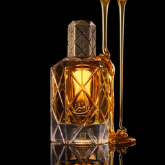 Ahmed Al Maghribi Bin Ameer with pouring honey on black glass