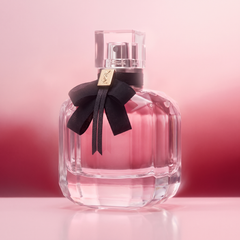 YSL Mon Paris against a pink to raspberry gradient