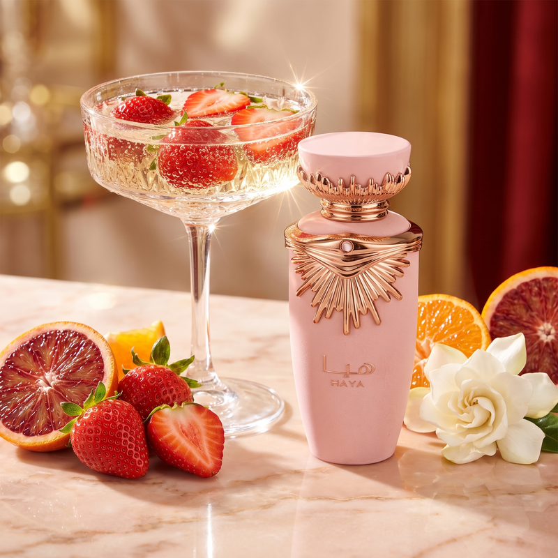 Lattafa Haya with champagne, strawberries, blood orange and gardenia