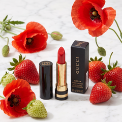 Gucci Sheer Lipstick 670 Ladybird in a luxury scene