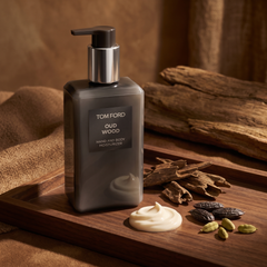 Tom Ford Oud Wood Hand and Body Moisturizer with cream texture, oud chips and tonka