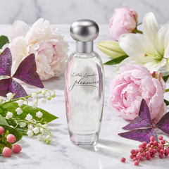 Estee Lauder Pleasures with lily-of-the-valley, peony and violet leaf
