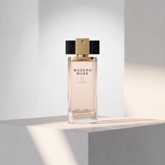 Estee Lauder Modern Muse on a sculpted pedestal