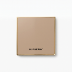 Burberry Outdoor Blush gold compact closed with Burberry logo